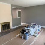 Living room renovation showing wall painting